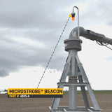 Microstrobes beacon on a irrigation set up with a cloudy sky background